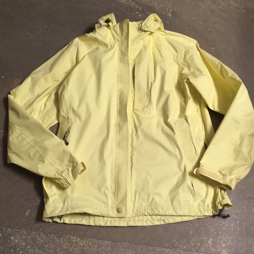 REI yellow rain jacket